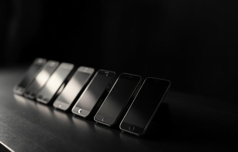 Used smartphones lined up for buy, sell, and trade
